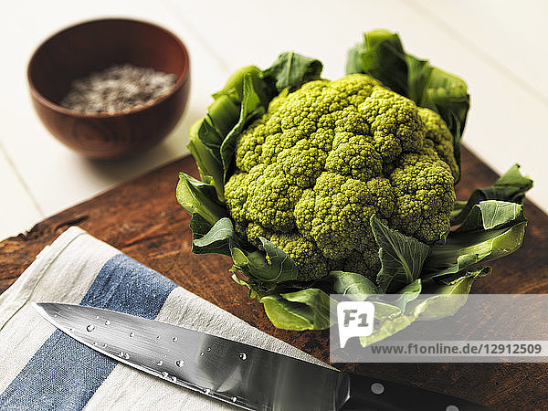 Romanesco broccoli on wooden board