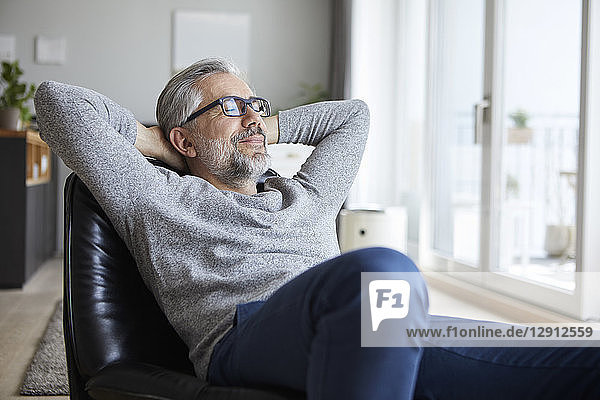 Portrait of mature man relaxing at home