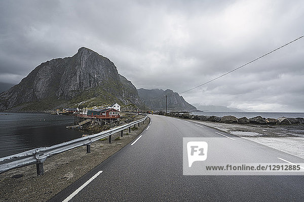 Norway  Lofoten  remote houses at the coast by the roadside