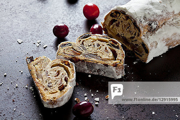 Sliced Christmas Stollen with icing sugar