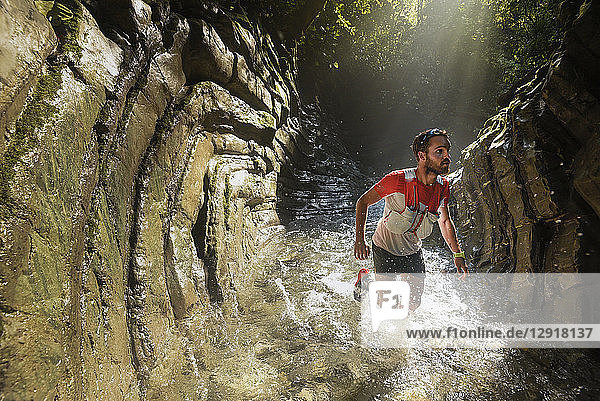 One man exploring a canyon at the area of Los Limones in Xicotepec de Juarez  Puebla  Mexico.