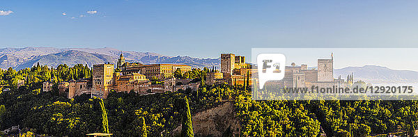 Panoramic view of Alhambra UNESCO World Heritage Site and Sierra Nevada mountains Granada Andalucia Spain Europe