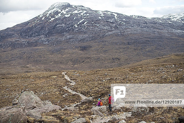 Hiking in the Scottish Highlands in Torridon along The Cape Wrath Trail towards Loch Coire Mhic Fhearchair  Highlands  Scotland  United Kingdom
