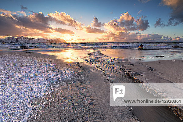 Ice on sand beach Vikten Flakstad municipality Lofoten Islands Nordland Norway