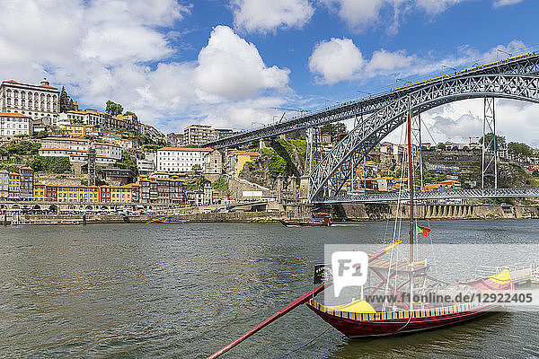 Traditional Rabelo boat on Douro River with view to the Dom Luis I Bridge  Porto  Portugal  Europe