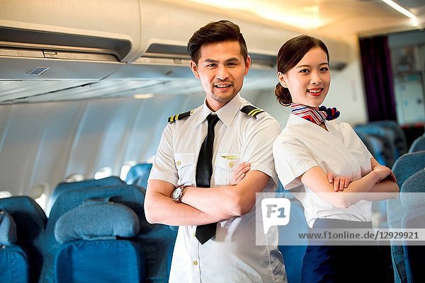 Two flight attendants in the cabin