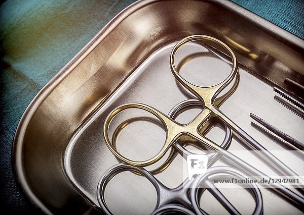 Several scissors for surgery in operating room of a hospital  conceptual image.