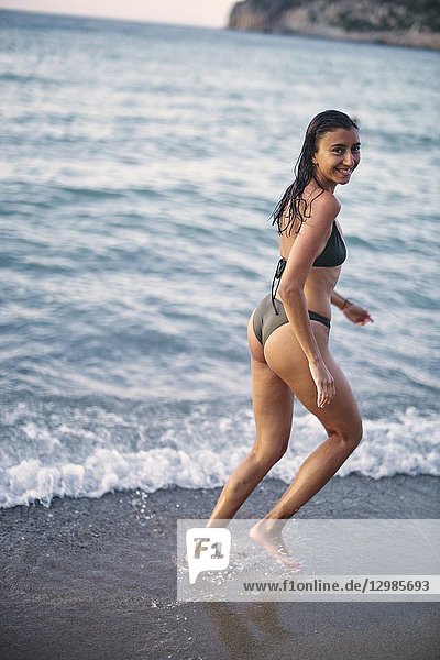 Woman at Potamos Beach  Crete  Greece.