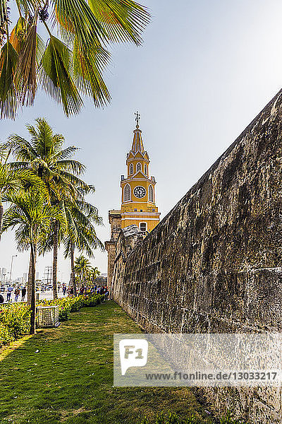 The colourful clock tower (torre del reloj) along the ancient city walls in Cartagena de Indias  Colombia