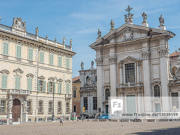 Manuta's Cathedral of Saint Peter on the left and the Bishop's Palace on the right  Mantua  Lombardy  Italy
