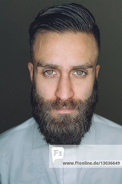 Portrait of young man with beard  close-up