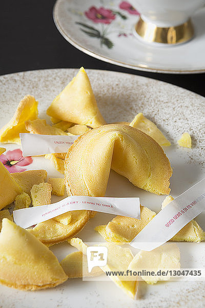 High angle view of fortune cookies in plate on table