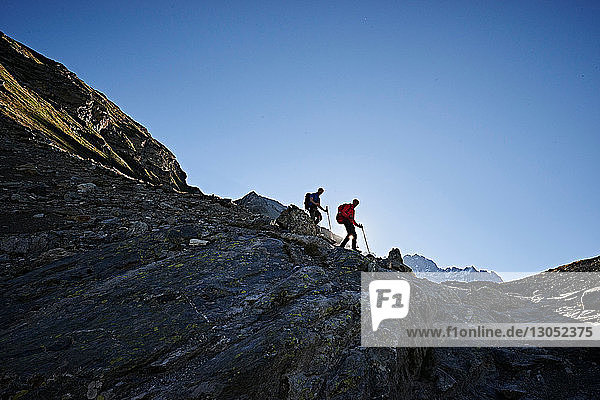Hiker friends in Mont Cervin  Matterhorn  Valais  Switzerland