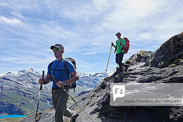 Hiker friends in Mont Cervin  Matterhorn  Valais  Switzerland