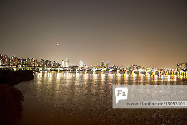 Illumination of Banpo Bridge reflected in water  Han River  Seoul  South Korea