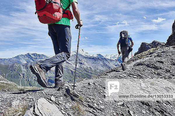Hikers on ridge  Mont Cervin  Matterhorn  Valais  Switzerland