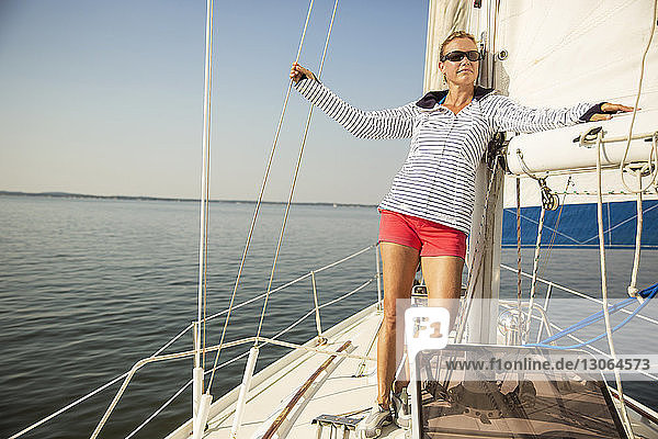 High angle view of woman sitting in yacht