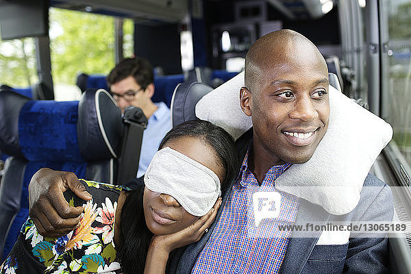 Couple relaxing in bus