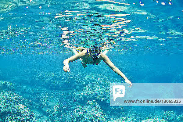 Woman snorkeling undersea