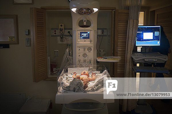 Baby lying in incubator