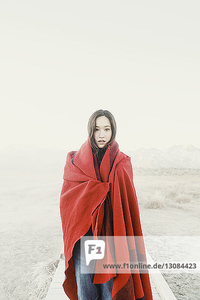 Portrait of beautiful woman standing at Mammoth Lake Hot Springs