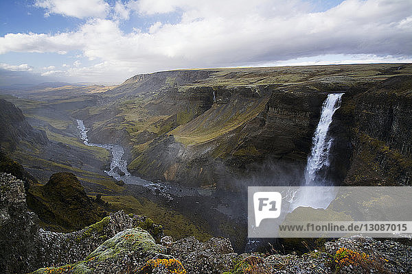 Scenic view of Haifoss waterfall against sky