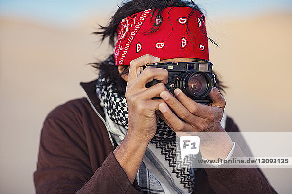 Man taking photo with camera