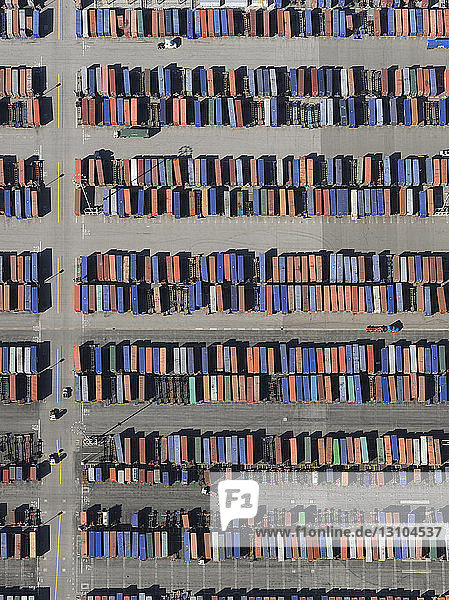 Aerial view trains in sunny shunting yard  Los Angeles  California  USA