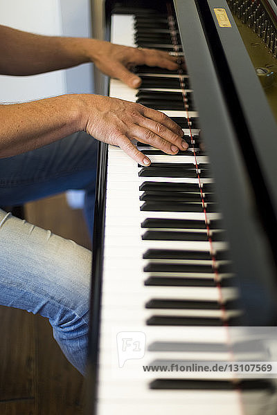A man playing the piano; Surrey  British Columbia  Canada