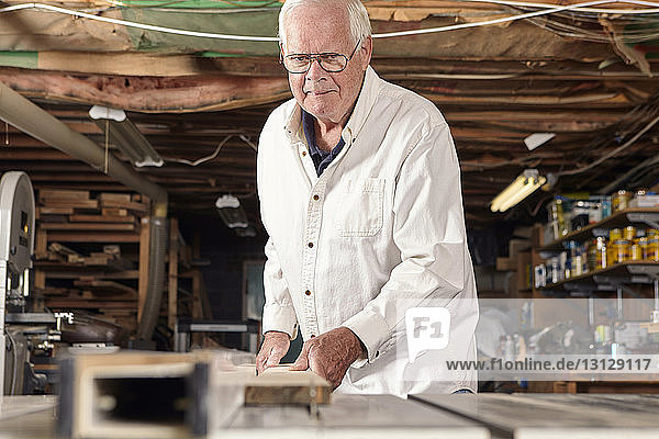Carpenter working in workshop