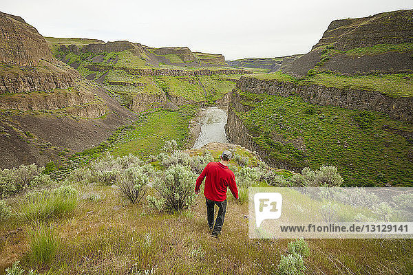 High angle view of man walking on mountain at Palouse Falls State Park
