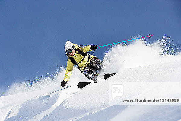 Woman skiing at speed