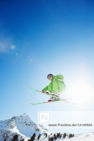 Skier jumping in midair