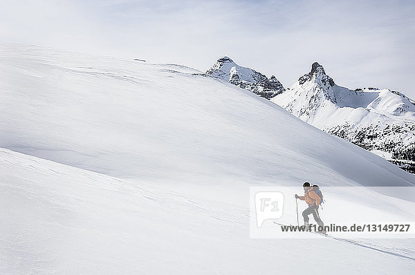 Man back country skiing on Parker Ridge   Banff National Park  Alberta  Canada