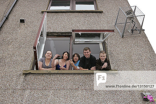 Five children looking out of window