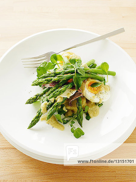 Plate of egg and asparagus salad