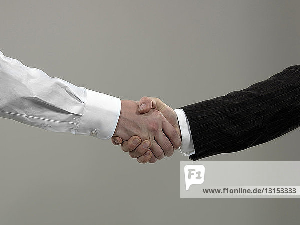 Business men shaking hands  close-up