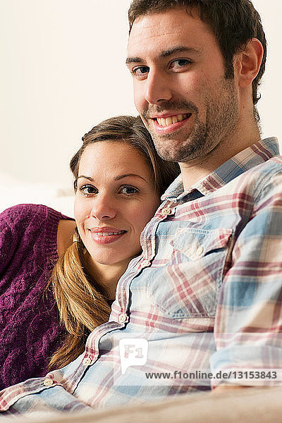 Portrait of young couple smiling