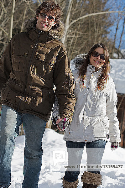 Couple in casual ski wear.