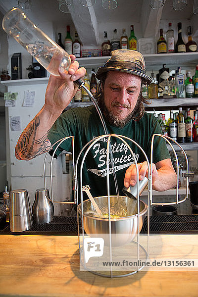 Barman mixing a cocktail  Ibiza  Spain