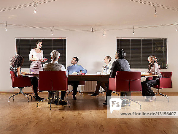 Group of people at boardroom meeting
