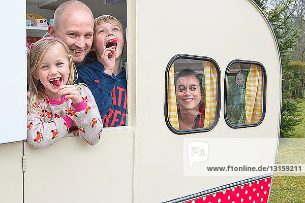 Portrait of family in caravan