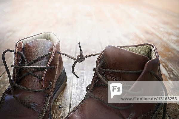 Boot laces tied together