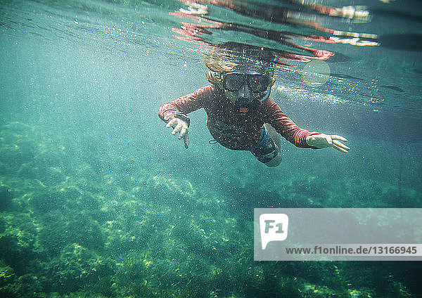 Underwater view of boy snorkeling  Menorca  Balearic islands  Spain
