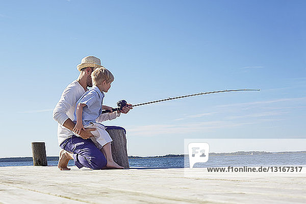 Father and son fishing  Utvalnas  Sweden