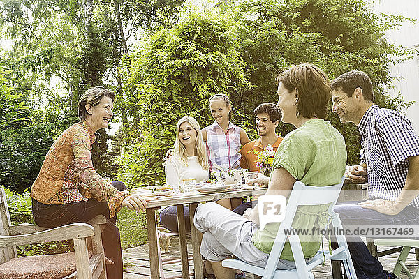 Family enjoying barbecue