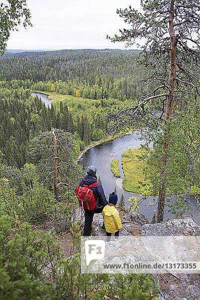 Finland  Oulanka National Park  mother and daughter standing in pristine nature