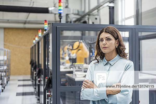 Portrait of a businesswoman  working in a manufacturing company