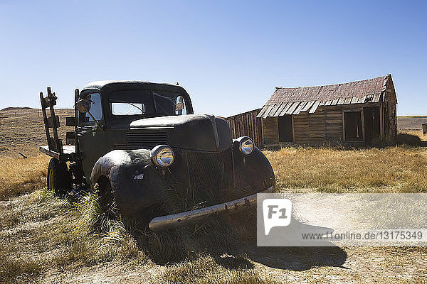 USA California Sierra Nevada Bodie State Historic Park old wooden house and car
