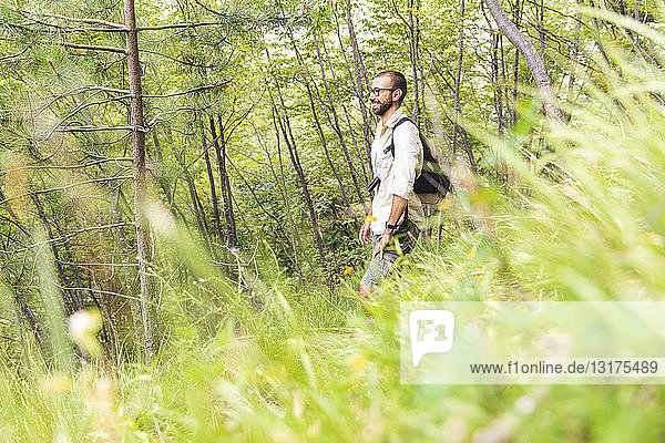 Italy  Massa  smiling man hiking in the Alpi Apuane mountains